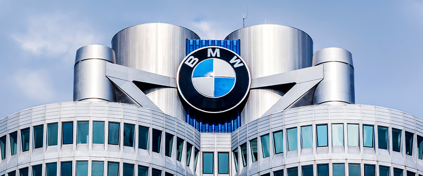 The iconic BMW sign adorning a building, symbolizing the brand's prominence in the automotive industry.