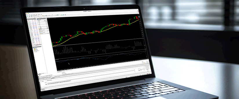 A laptop displaying a forex trading chart on its screen, illustrating market trends and data analysis.