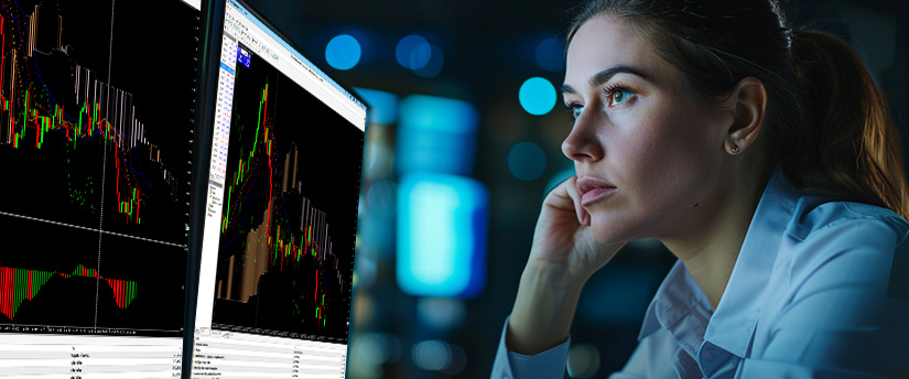 Trader analysing charts while preparing for an upcoming trading session