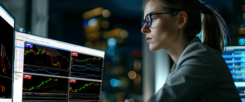 Trader analyzing candlestick charts for a potential dark cloud cover reversal pattern
